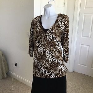 Slightly worn leopard print pull on blouse